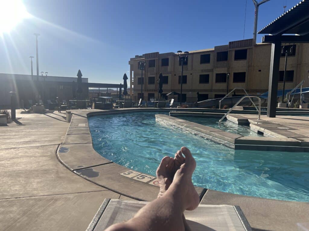 Relaxing by a sunny outdoor poolside