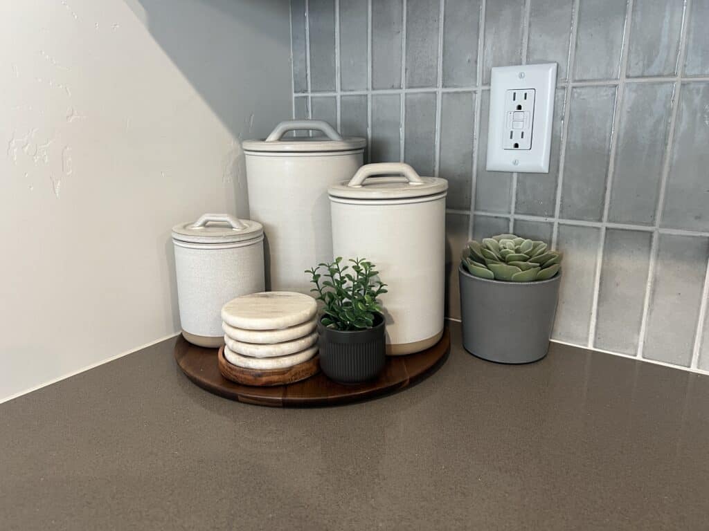 Kitchen countertop with canisters and plants